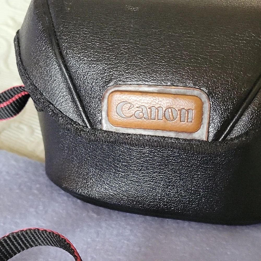 Canon Vintage Black Film Camera with Red Accents